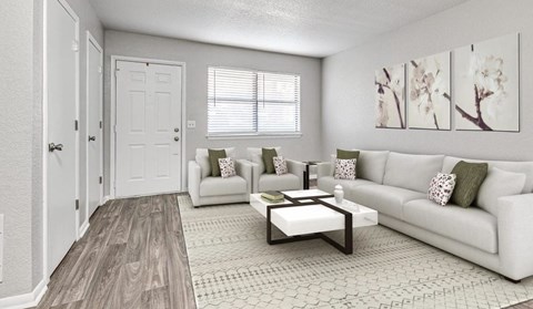 a living room with a couch and a table